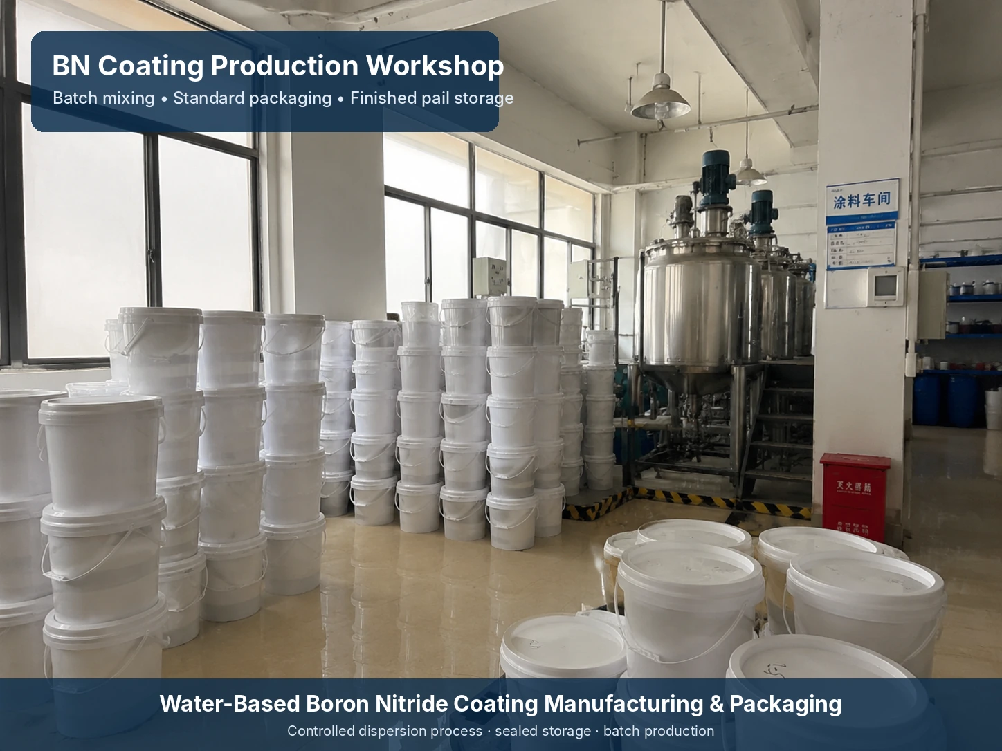 Boron nitride coating production workshop with mixing equipment and finished product pail storage